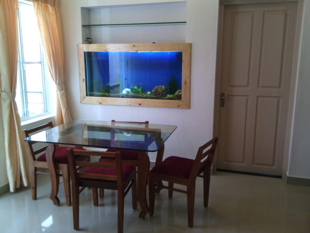 Nathans Holiday Home Kochi Rum bild